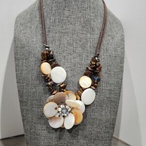 Shell stone flower necklace on brown cord crystal and tiger eye beads